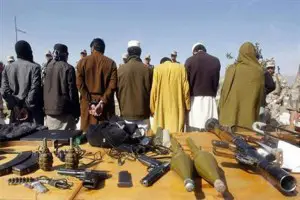 This (file?) photo of Taliban and their weapons ran in a Pakistani article on the massacre. These Soviet-pattern weapons are also used by Pakistani paramilitary forces.