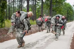 This is the picture Military.com used to illustrate their story. Presumably it shows the Corps of Commissars learning how to carry female Ranger candidates through the course.