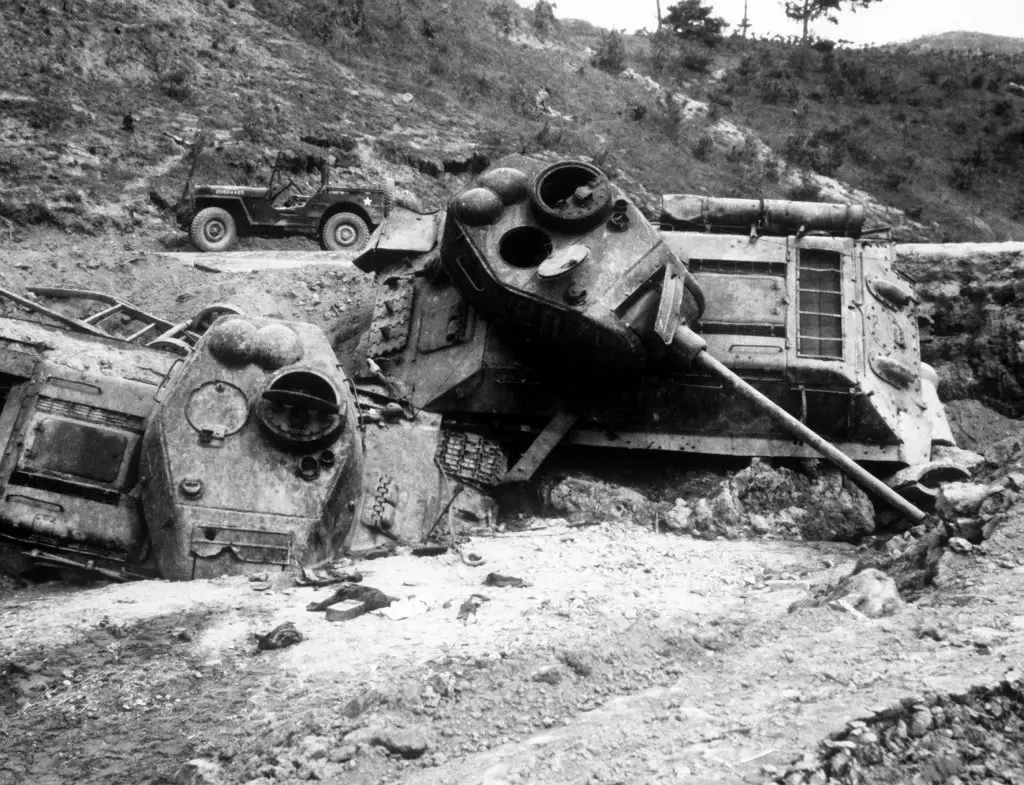 Original caption: Napalm Bomb Victims.  Mute testimony of accuracy of close support missions flown by Fifth Air Force fighters are these Red Korean tanks, blasted out of the path of advancing 24th Infantry Division units near Waegwan, Korea. AIR AND SPACE MUSEUM#:  77799 AC