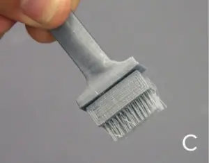 The bristles are deposited integrally as the brush is produced. 