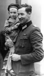 Wilm Hosenfeld with a Polish infant on his arm, September 1940