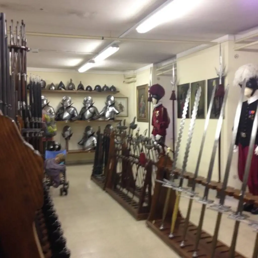 A longer shot from about the same position as the last, showing some of the vintage edged weapons and armor.