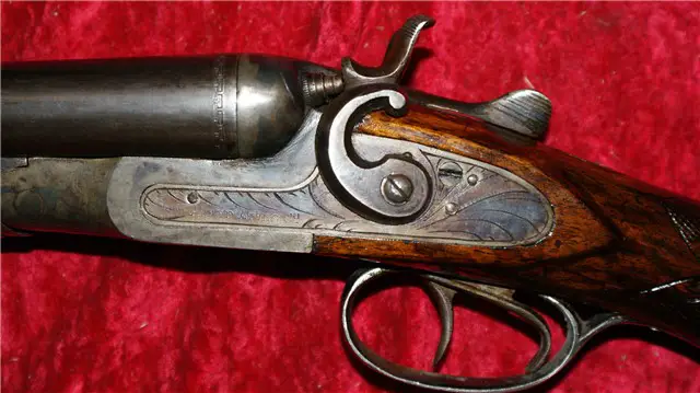 This Union Machine Co gun is Belgian proofed. It's in remarkable condition -- the bores on these old guns are often trashed by corrosive cartridges of the day.