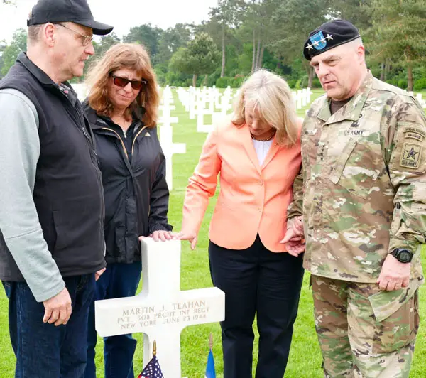 The Farrells and GEN Mark Milley and his wife at Teahan's grave in Normandy.