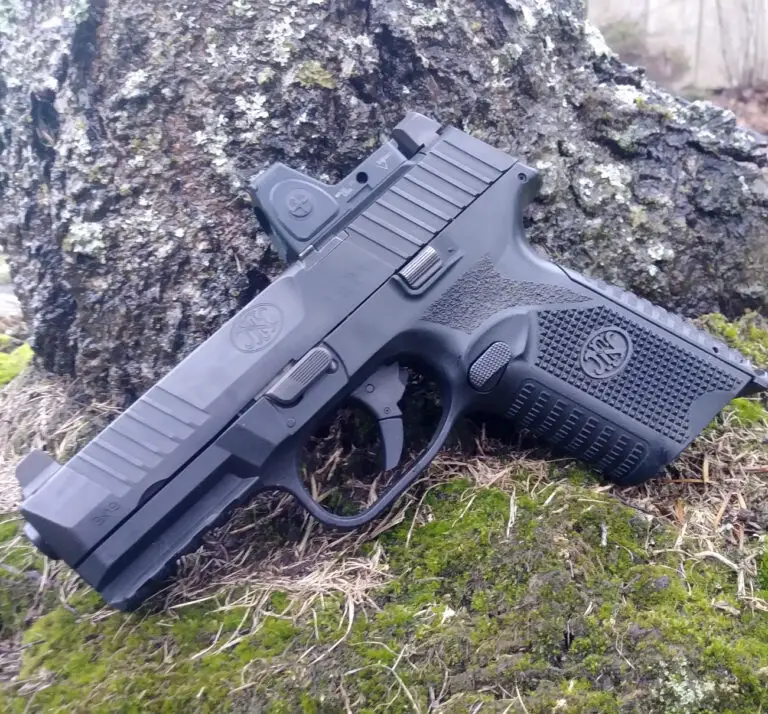 FN 509 Midsize Pistol side view with red dot sight