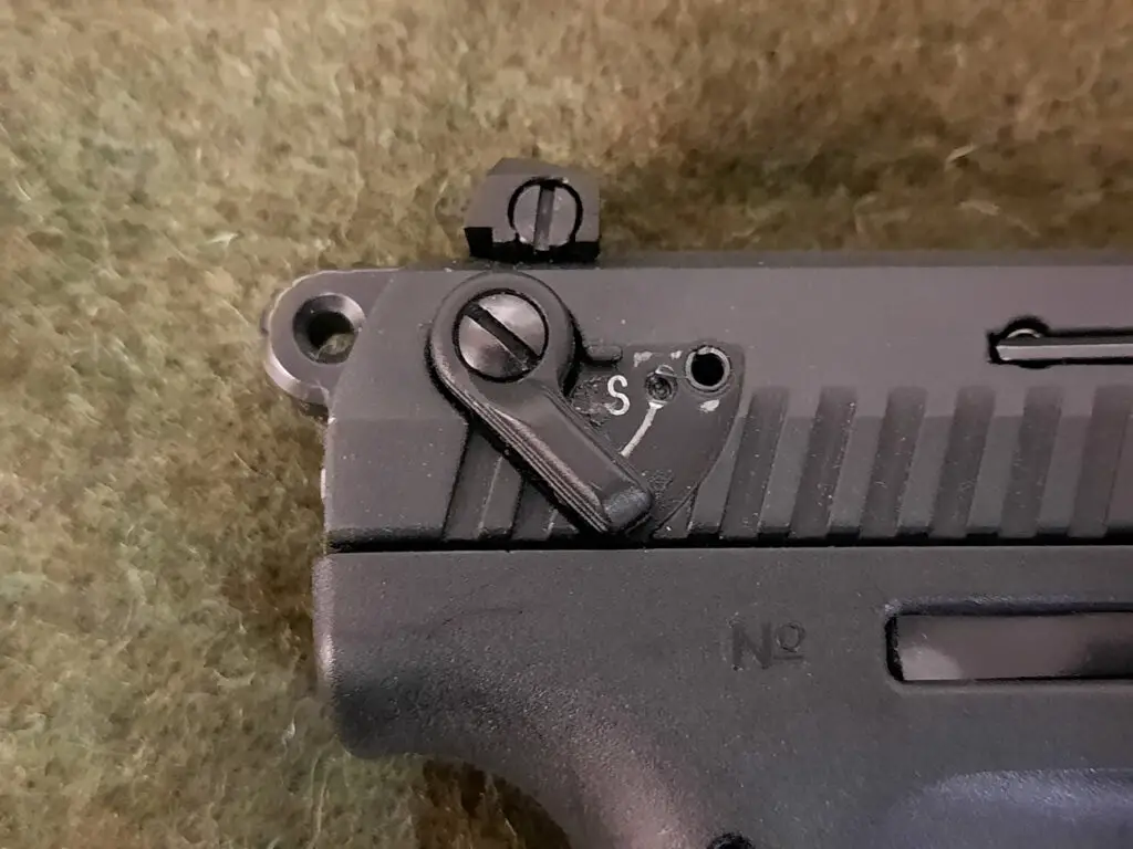 Walther P22 safety turned on with S visible