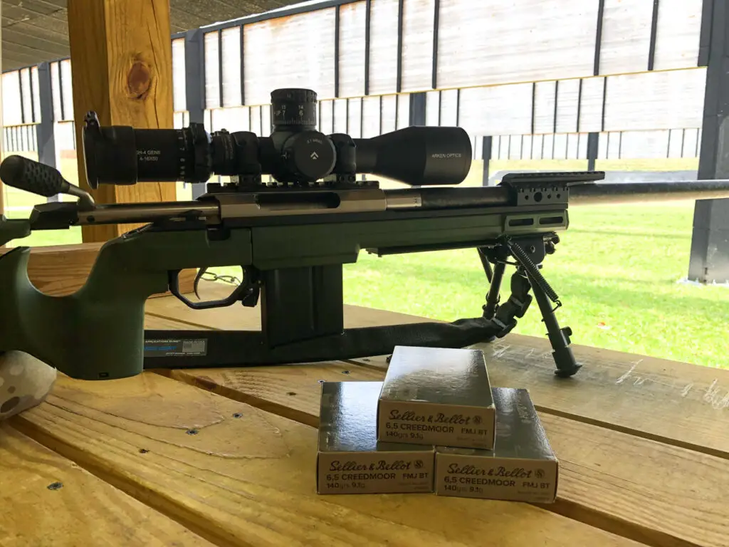 Arken Optics SH4 GenII scope at the gun range zeroing in with a rifle