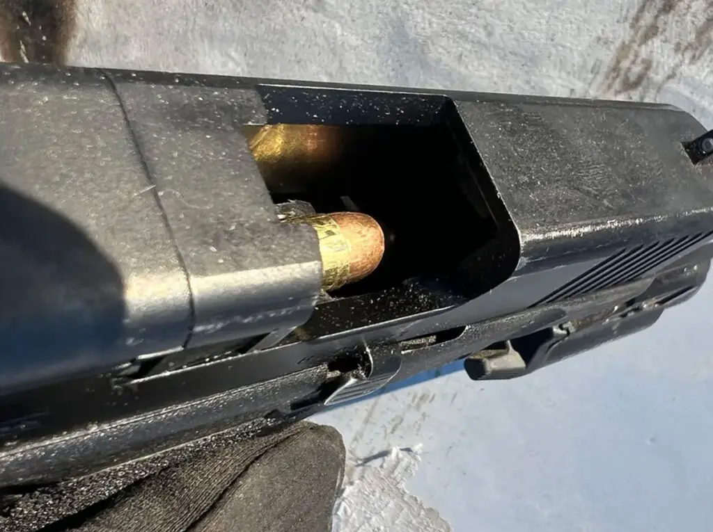 Glock 19 with a bullet in the chamber possible ejection issue