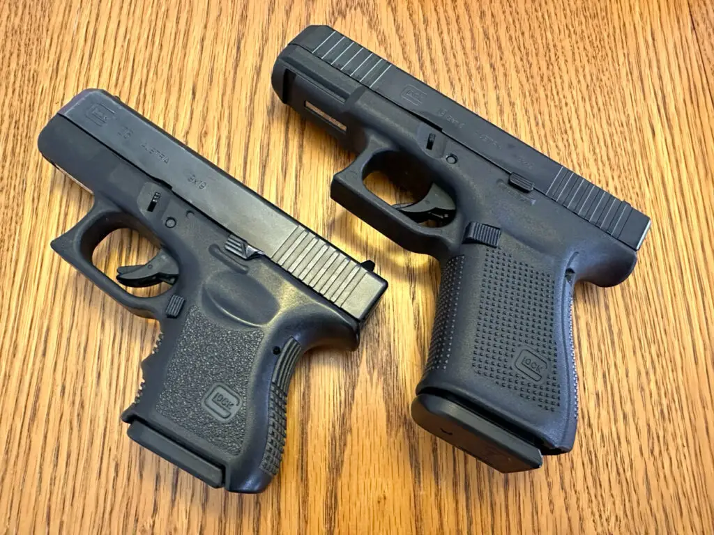 Glock 19 vs Glock 26 on a table size comparison