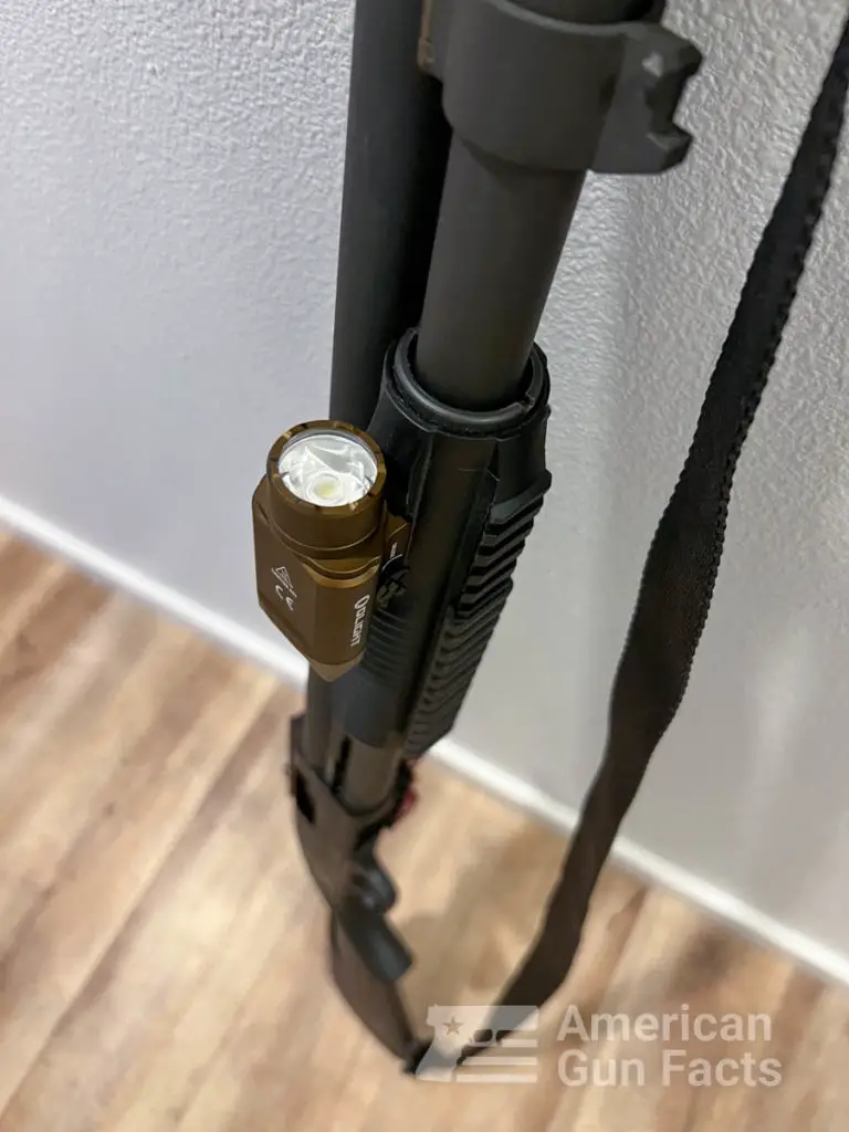 Olight pl3 mounted on shotgun